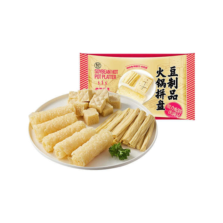 盒马大豆制品火锅拼盘包装正面，包含响铃卷、鲜腐竹和冻豆腐三种食材。