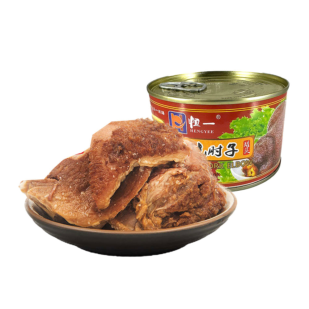 恒一红烧肘子罐头内容物特写，带皮猪肘软糯酥烂，胶质满满色泽红亮。