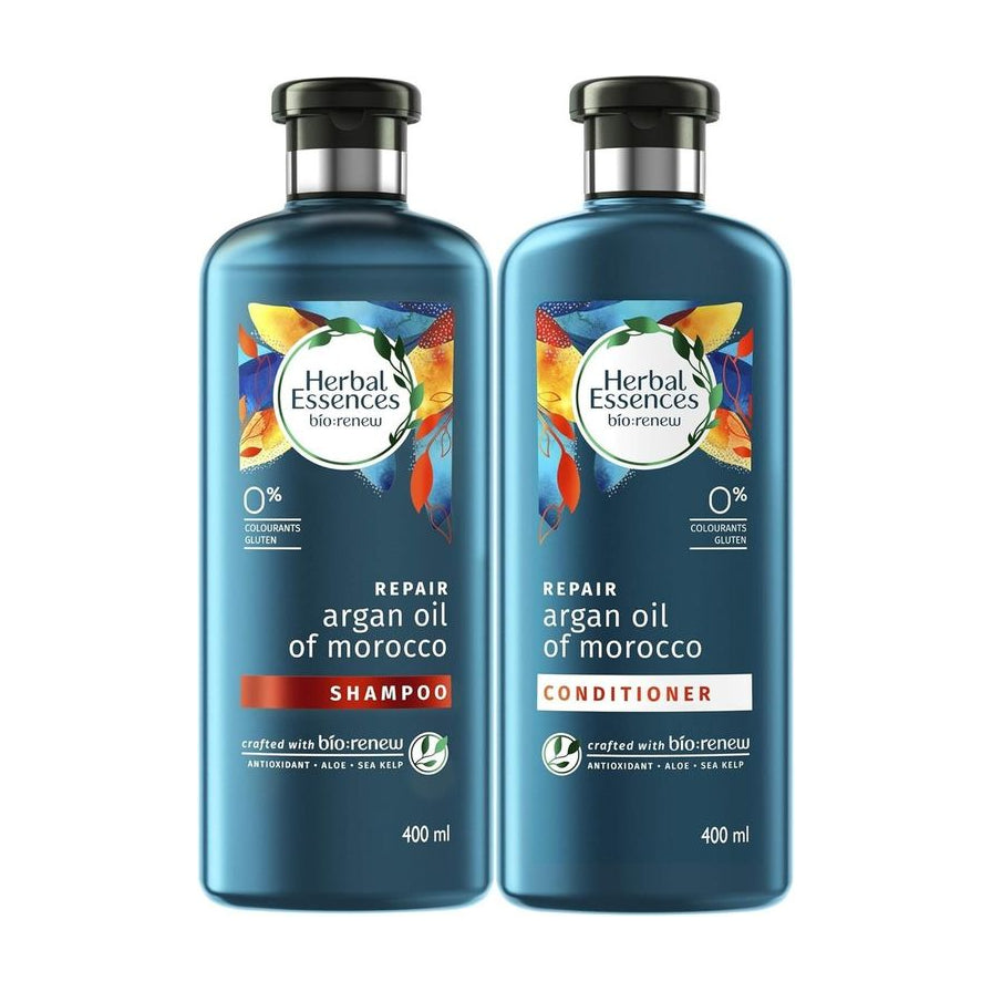 Herbal Essences 摩洛哥坚果油修护洗发水与护发素双瓶套装正面展示，蓝色瓶身。