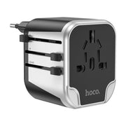 hoco 浩酷 AC5 全球通用旅行转换插头，黑色立方体设计，侧面带有 EU、UK、US/AUS 伸缩插头滑块，正面为多功能插座孔位。
