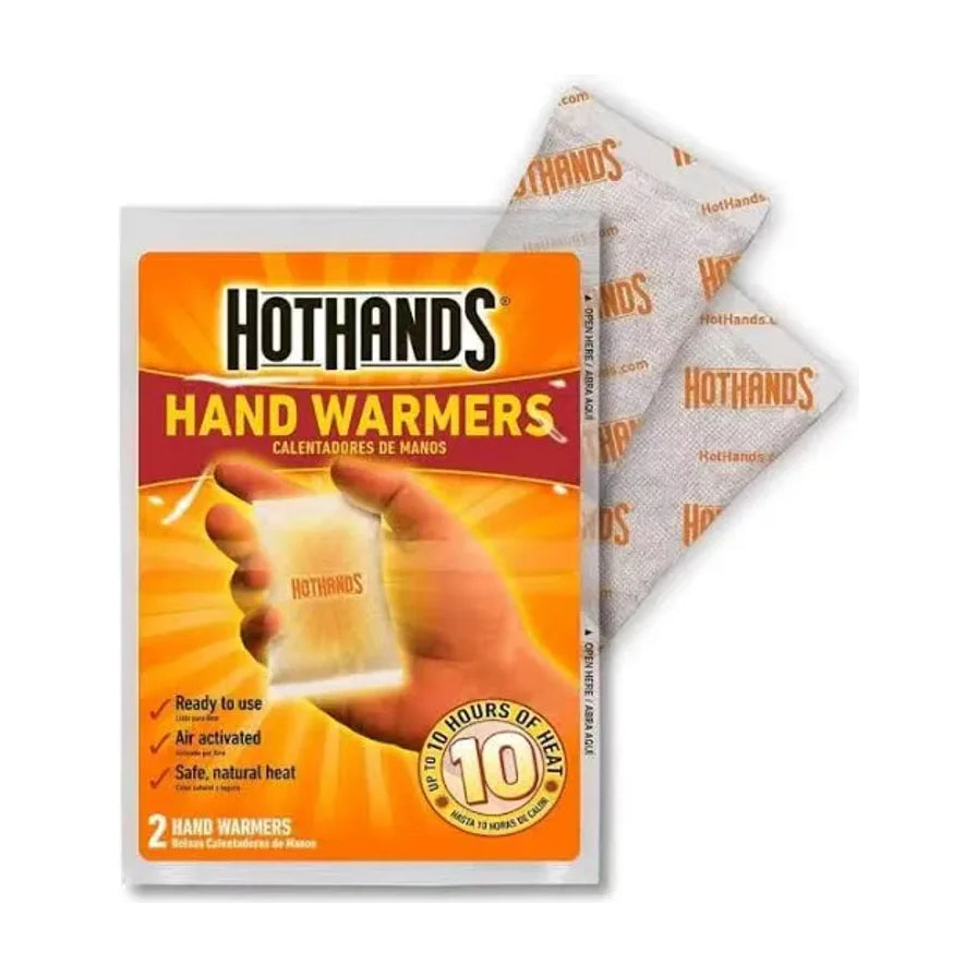 HotHands 手握式暖手贴 2片装正面包装及内部发热包展示，标注有 10 小时发热时长及空气激活说明。