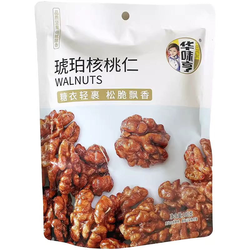 华味亨琥珀核桃仁特写，展示糖衣轻裹的饱满整仁与酥脆质感