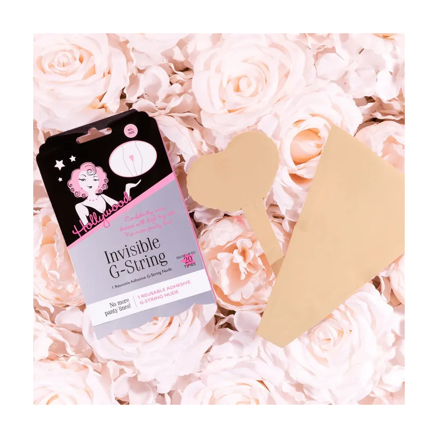 隐形 G 带产品包装与肉色胶贴实物平铺展示，背景为白色玫瑰花装饰。