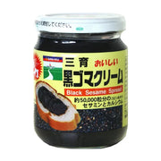 日产三育黑芝麻酱瓶装正面图，包装上印有涂抹了黑芝麻酱的吐司和黑芝麻颗粒，标注有 Black Sesame Spread 字样。