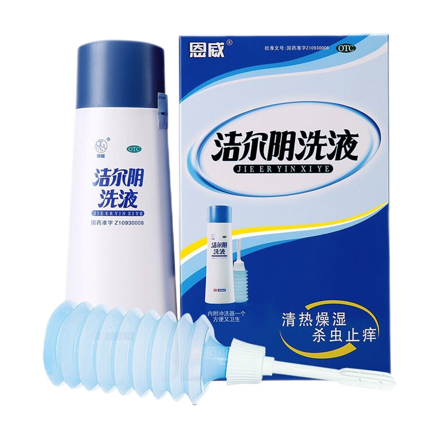 洁尔阴洗液300ml瓶装与包装盒，前方配有蓝色透明的专用阴道冲洗器，展示产品外观与配件。