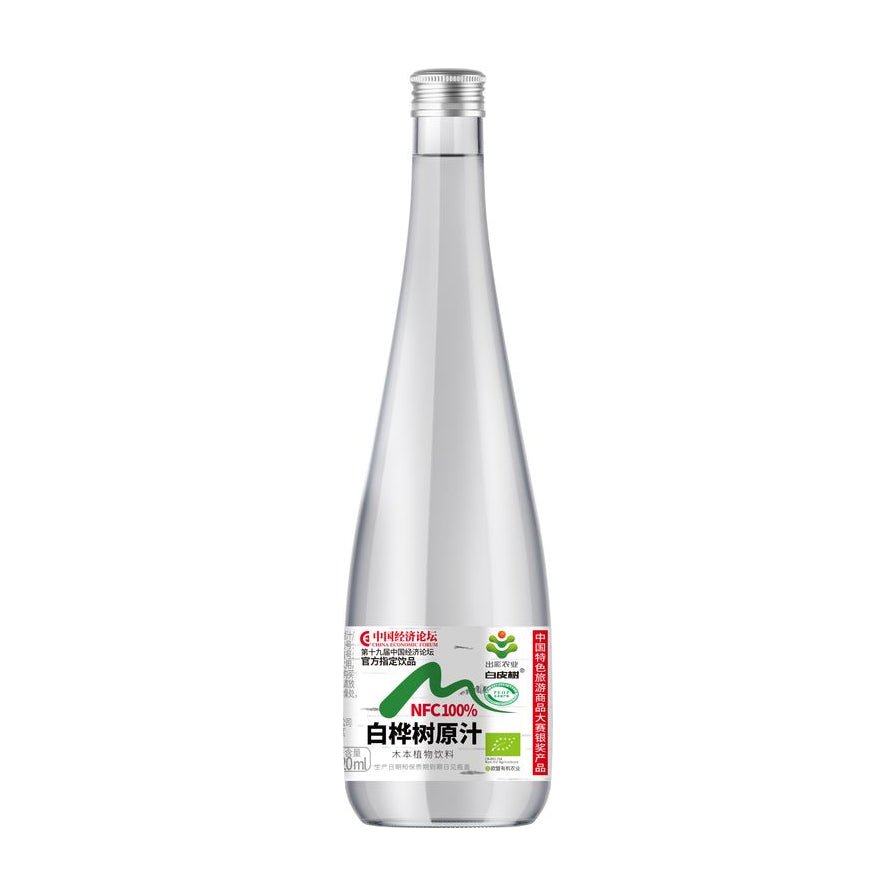 吉林白皮树白桦树原汁320ml玻璃瓶装，瓶身标签印有NFC100%纯植物饮品字样，白色背景下的商品正面展示。