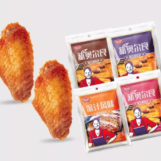 极美滋新奥尔良腌料四包混装组合，包含蜜汁、低辣、中辣及经典口味四种小包装。