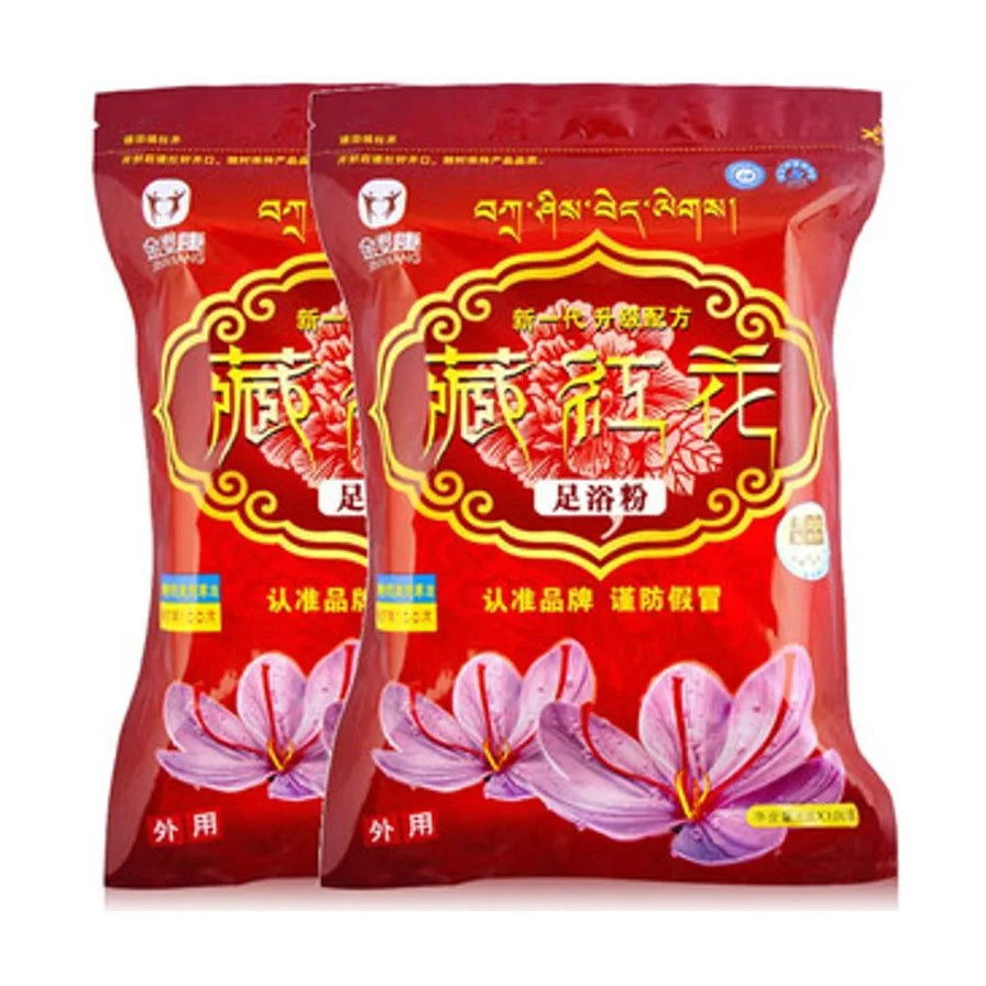 两袋红色包装的金泰康藏红花足浴粉，印有紫色花朵图案。