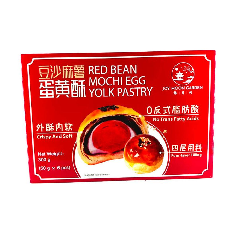 禧月阁豆沙麻薯蛋黄酥红色包装盒，正面印有蛋黄酥剖面图，展示四层用料，标注0反式脂肪酸，净含量300克。