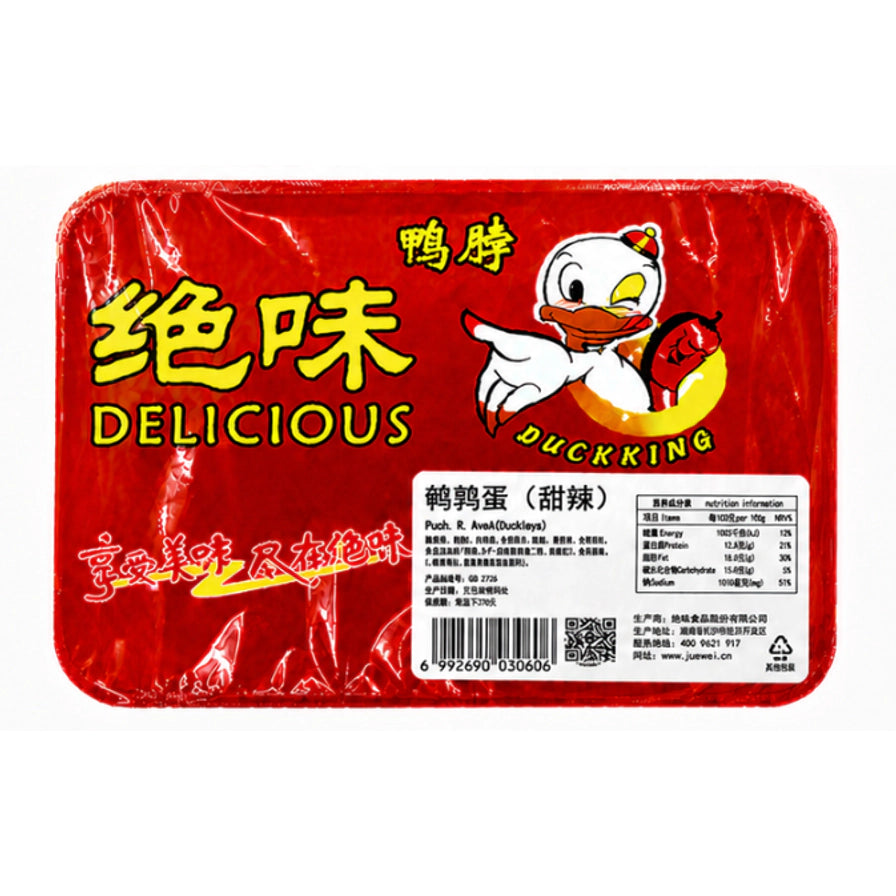绝味甜辣口味鹌鹑蛋的红色密封包装正面，显示产品名称为鹌鹑蛋（甜辣）及详细生产信息。