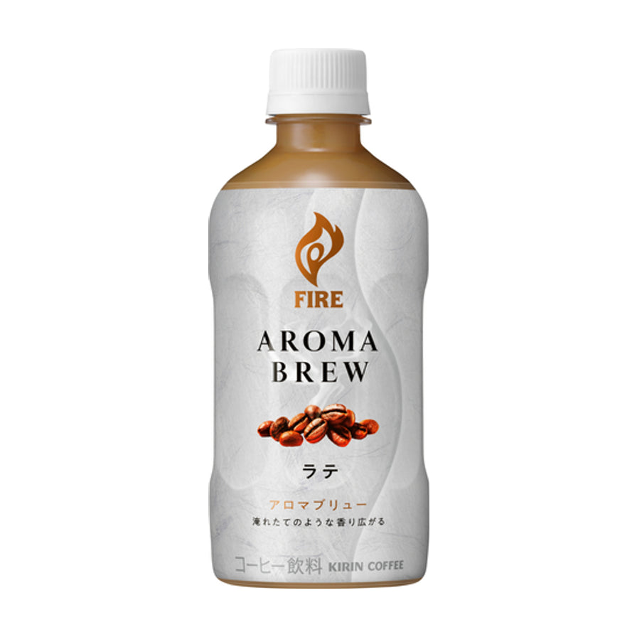 麒麟 Kirin 火焰直火焙煎咖啡，白色包装瓶装牛奶咖啡，瓶身印有 FIRE AROMA BREW 字样及咖啡豆图案。