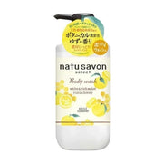 KOSE 高丝 Softymo natu savon select 柚子蜂蜜滋润型沐浴露 500ml 正面图，白色瓶身印有柚子与蜂巢图案，顶部带有黄色宣传标签。