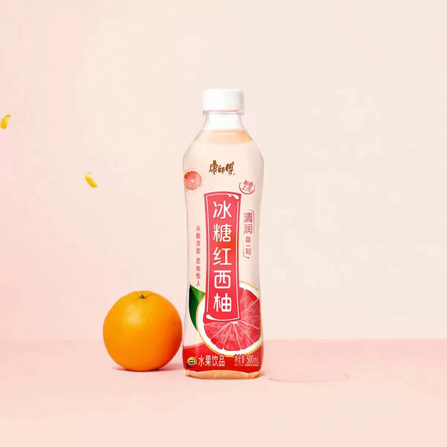 康师傅冰糖红西柚500ml瓶装，白色瓶身配红西柚图案，清润口感。