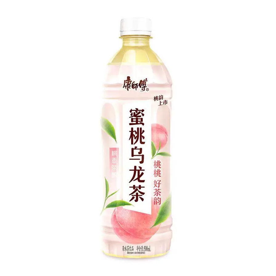 康师傅蜜桃乌龙茶500ml瓶装，粉色包装，甜美桃香与乌龙茶韵。