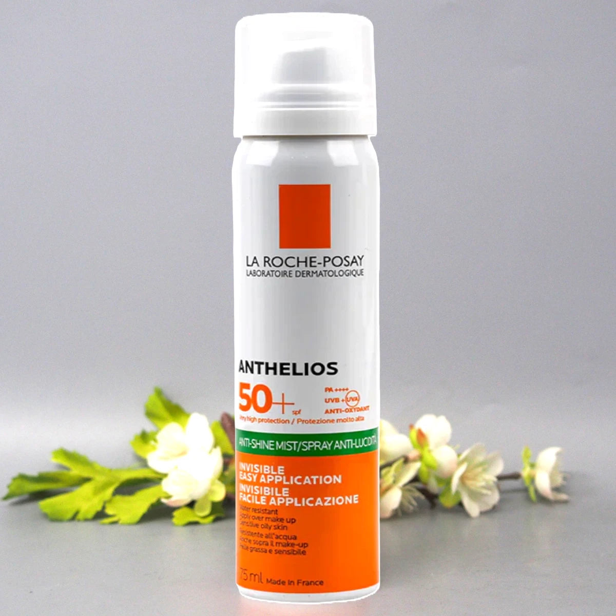 理肤泉隐形防晒喷雾 SPF50+ 瓶身正面图，白色简约包装，适合敏感肌日常通勤使用