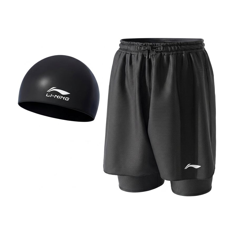 李宁黑色沙滩裤与同色系泳帽套装，白色背景展示，沙滩裤为双层防走光设计，印有品牌Logo。