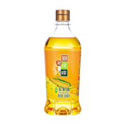 狮球麦玉米油900ml瓶装，透明瓶身展示金黄色油脂，标签印有狮子卡通形象和玉米图案。