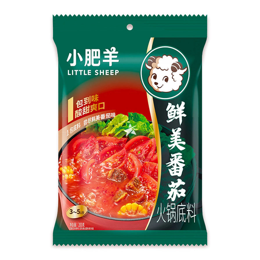 小肥羊鲜美番茄火锅底料包装正面图，展示浓郁番茄汤底与新鲜番茄图案。