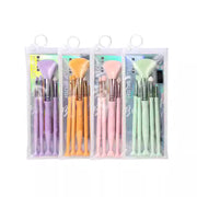 LMLTOP 倾心系列化妆刷套装，展示紫色、橙色、粉色和绿色四种马卡龙色系的便携收纳包装。