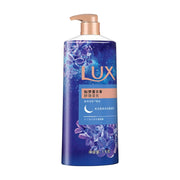 力士晚安香薰沐浴露正面图，紫色星空瓶身配金色泵头，标签显示如梦薰衣草香及 1kg 净含量。