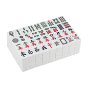 白色麻将牌整齐叠放在白色背景上，牌面可见万字、条子、筒子和字牌图案。