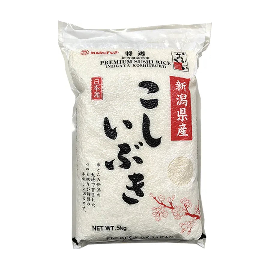 丸藤新潟越息吹米5kg包装正面图，透明袋装可见饱满白米，印有新潟县产、日本产及Premium Sushi Rice字样。