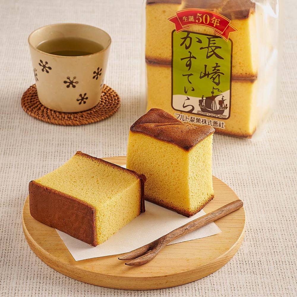 丸多蜂蜜蛋糕整盒包装正面图，清晰展示品牌 Logo、产品名称及净含量信息。