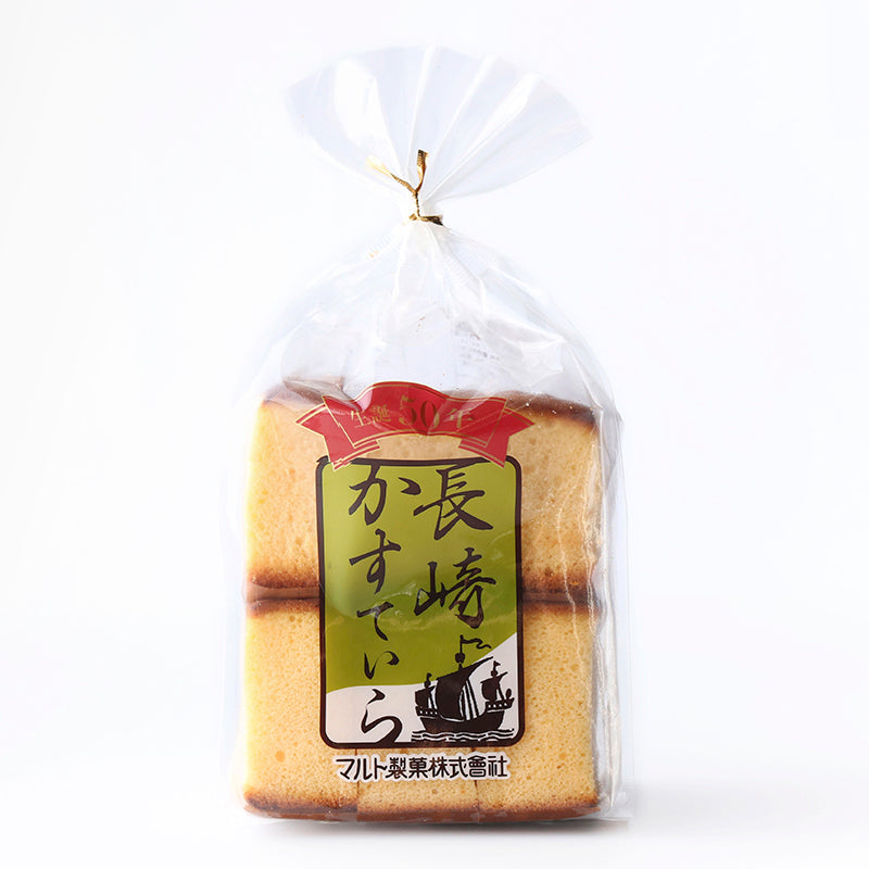 丸多蜂蜜蛋糕独立包装特写，展示单片撕开后的松软质地与内部气孔细节。