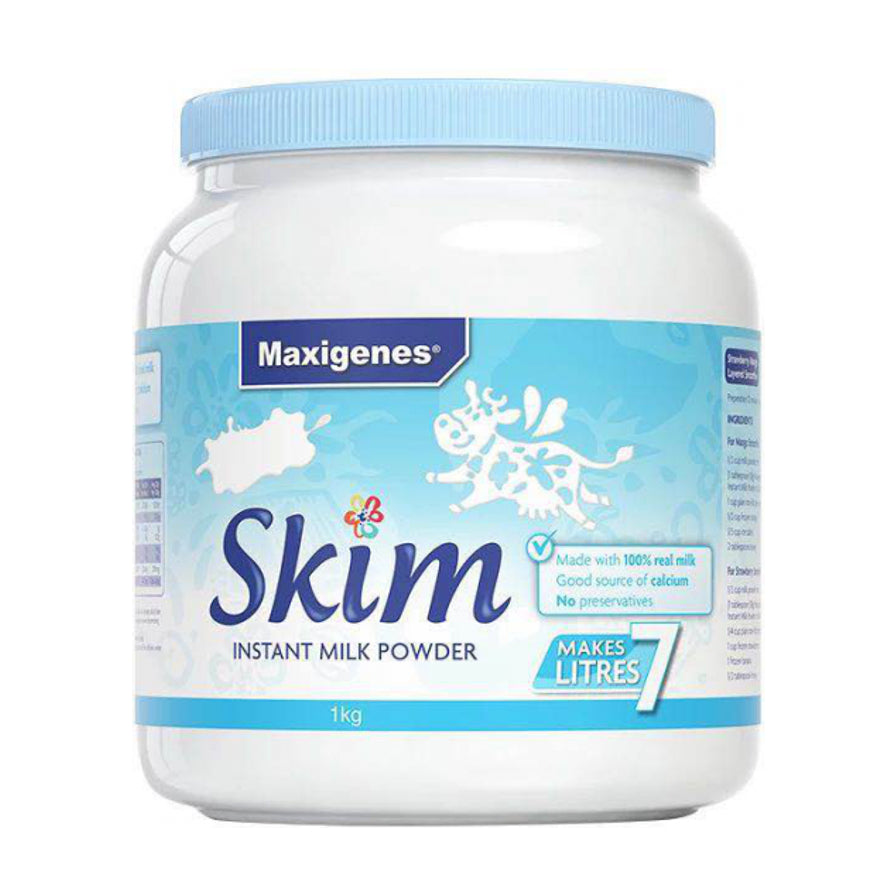 Maxigenes美可卓蓝胖子脱脂奶粉1kg罐装正面图，展示蓝色盖子和白色罐身，标签印有Skim Instant Milk Powder字样。