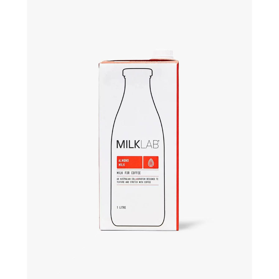 MILKLAB 咖啡专用杏仁奶 1L 纸盒包装正面，白色背景，包装上有红色标签和 ALMOND MILK 字样