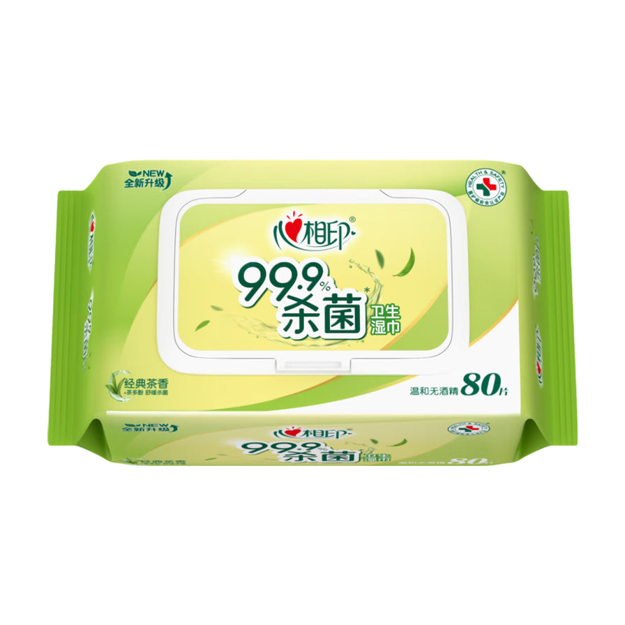 心相印卫生杀菌湿巾绿色包装正面图，带有白色密封盖，标注99.9%杀菌、经典茶香及80片规格。