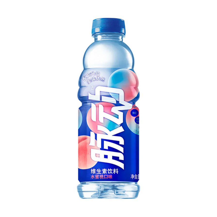 脉动水蜜桃口味维生素饮料，蓝色瓶身印有粉色水蜜桃图案，净含量600毫升。