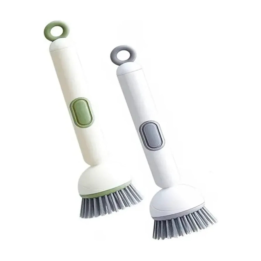 两把摩登主妇加液旋转锅刷，分别为绿色和白色，展示其长手柄和按压出液按钮设计。