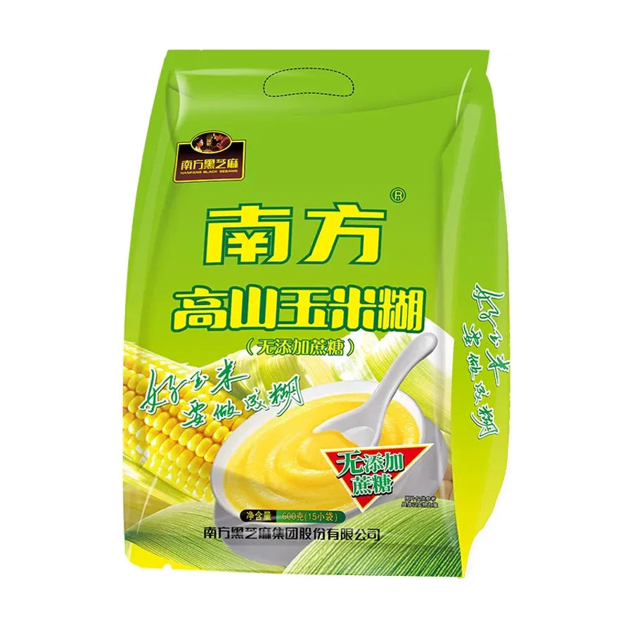 南方高山玉米糊无添加蔗糖版绿色包装袋，正面印有玉米图案和冲调好的玉米糊碗装效果图。