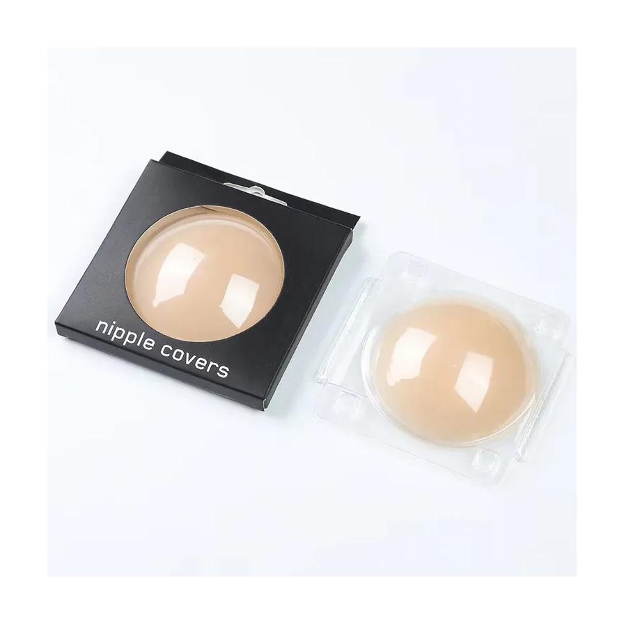 南极人肤色乳贴产品主图，展示黑色包装盒及透明收纳盒内的圆形硅胶胸贴。