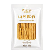 东方谷物山药腐竹250g包装正面图，白色包装袋中心透明窗口可见干燥的条状腐竹，印有OriGrain品牌标识。