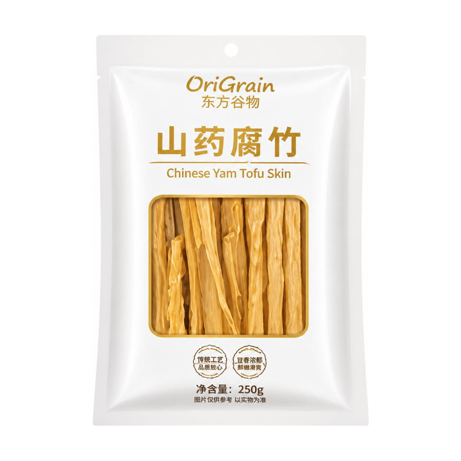 东方谷物山药腐竹250g包装正面图，白色包装袋中心透明窗口可见干燥的条状腐竹，印有OriGrain品牌标识。