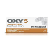 OXY 5 遮瑕祛痘膏盒装正面图，白底展示包装，盒身可见 CAMOUFLAGE CREAM、Benzoyl Peroxide 50 mg/g、SKIN - TONE COVER - UP 和 22g 字样