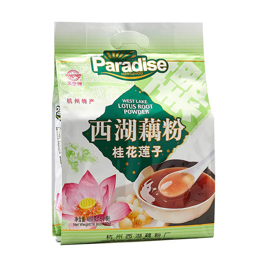 天堂牌西湖藕粉桂花莲子味包装正面图，绿色调包装，包装袋上印有西湖风景底纹和冲泡好的藕粉。