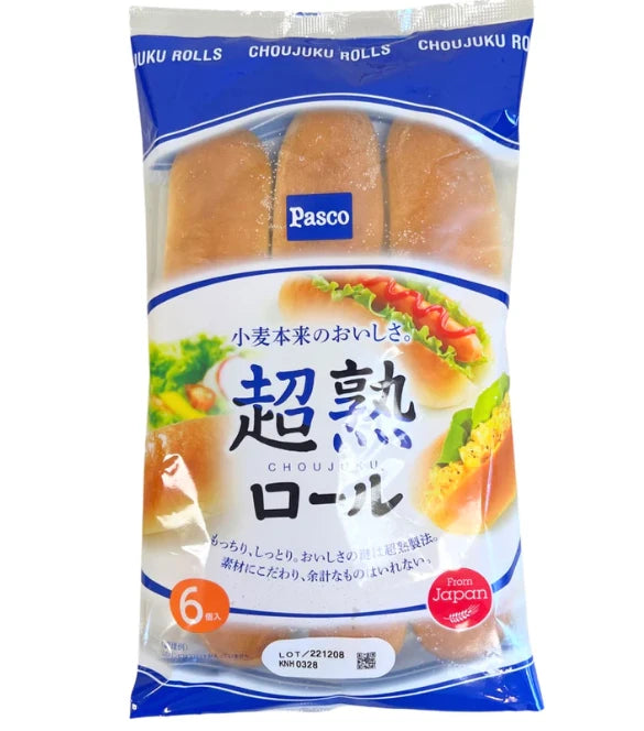 Pasco 超熟全麦面包卷包装正面，展示 6 枚入橄榄形餐包及日文品牌标识