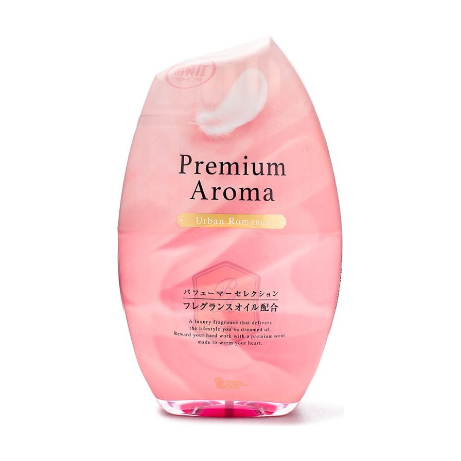 小鸡 Premium Aroma 室内芳香剂荔枝玫瑰香型正面图，粉色半透明瓶身，标签印有 Urban Romance 字样及羽毛装饰。
