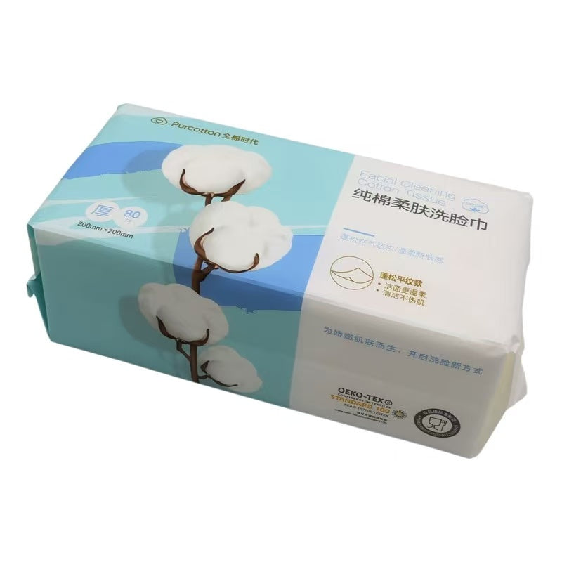全棉时代纯棉柔肤洗脸巾产品包装正面图，蓝白配色印有棉花图案及规格信息。