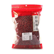 钎诚澳洲红豆透明袋装正面图，展示饱满的红豆颗粒，包装上有钎诚精选和澳洲红豆字样。