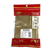 钎诚精选黑胡椒粉100g袋装，透明包装可见细腻粉末，红色封口设计，带有营养成分表和条形码。