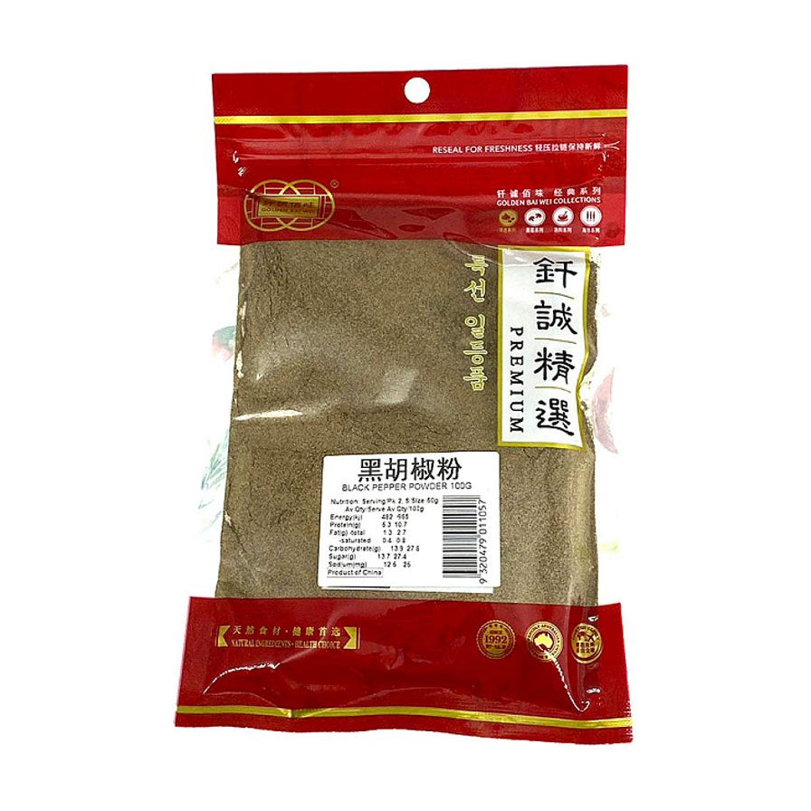 钎诚精选黑胡椒粉100g袋装，透明包装可见细腻粉末，红色封口设计，带有营养成分表和条形码。
