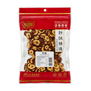 钎诚精选枣圈，透明包装袋内装满切成圆环状的酥脆红枣片，包装上有红色封条和营养成分表。