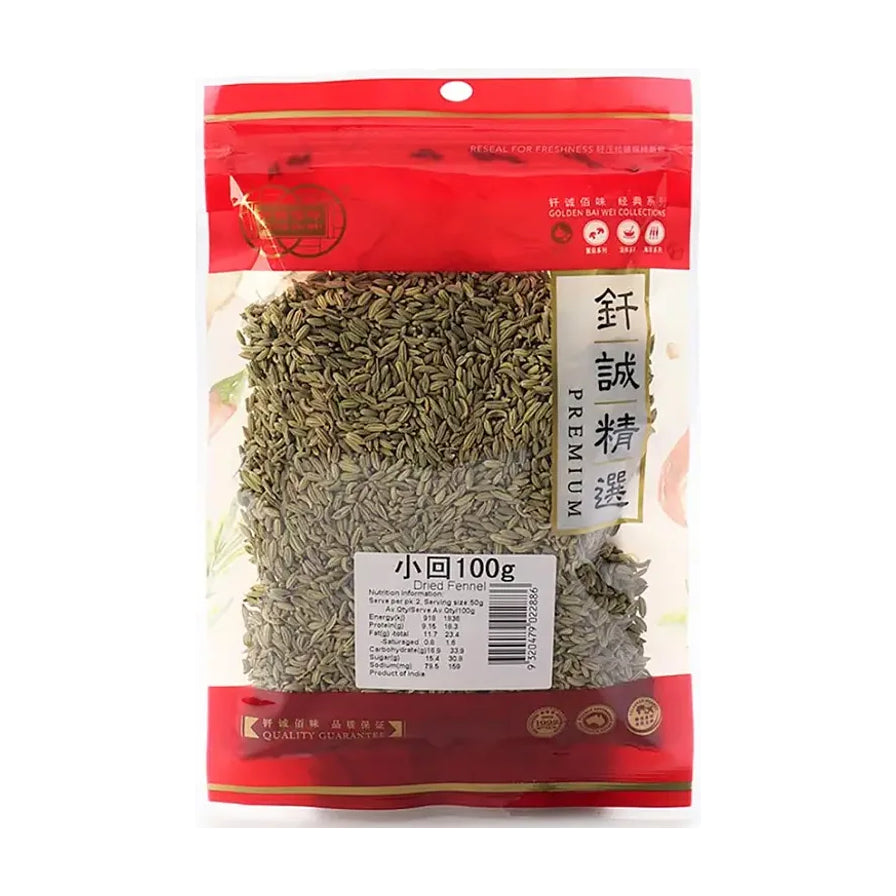 钎诚精选小茴香100g袋装，透明包装可见饱满的绿色小茴香颗粒，包装上有红色封条和营养成分表。