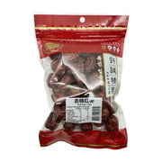 钎诚去核红枣150g袋装，透明包装展示饱满红枣，背景配有茶壶、茶杯及盛放红枣的木盘。