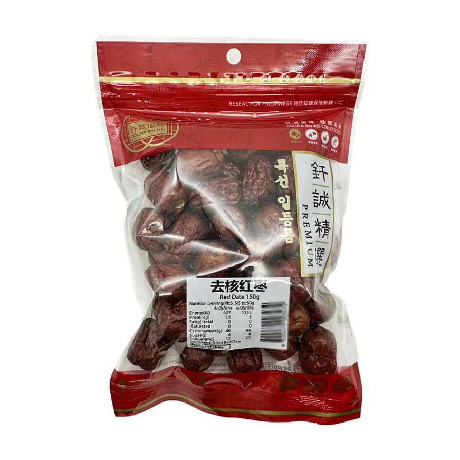 钎诚去核红枣150g袋装，透明包装展示饱满红枣，背景配有茶壶、茶杯及盛放红枣的木盘。