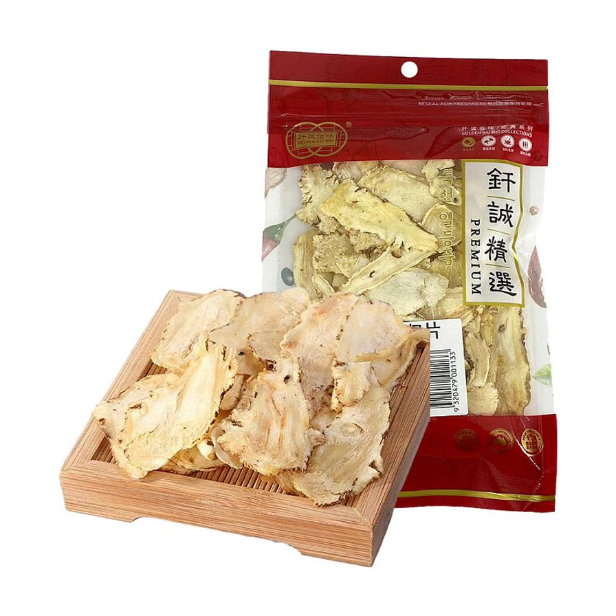 钎诚特级当归片，包含50g透明袋装产品及木托盘上展示的干燥当归切片，片型整齐，色泽自然。